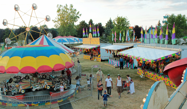 Part of the midway and games of chance area in the east field