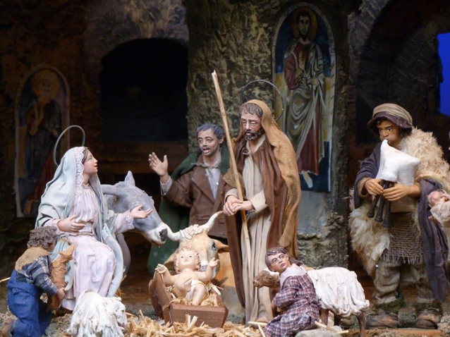 The Holy Family is set inside a grotto decorated with Byzantine frescoes. (CNS/Carol Glatz)