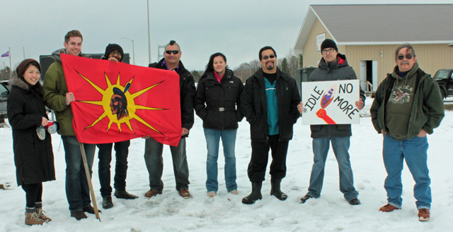 Some Akwesasne Residents and others who came to study the situation pose outside The People's Fire on Cornwall Island