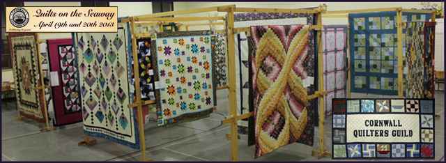 Quilt displays in Trinity Hall